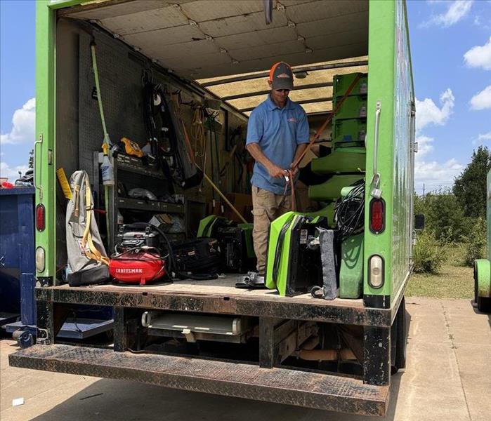 SERVPRO technician loading a box truck for the next project